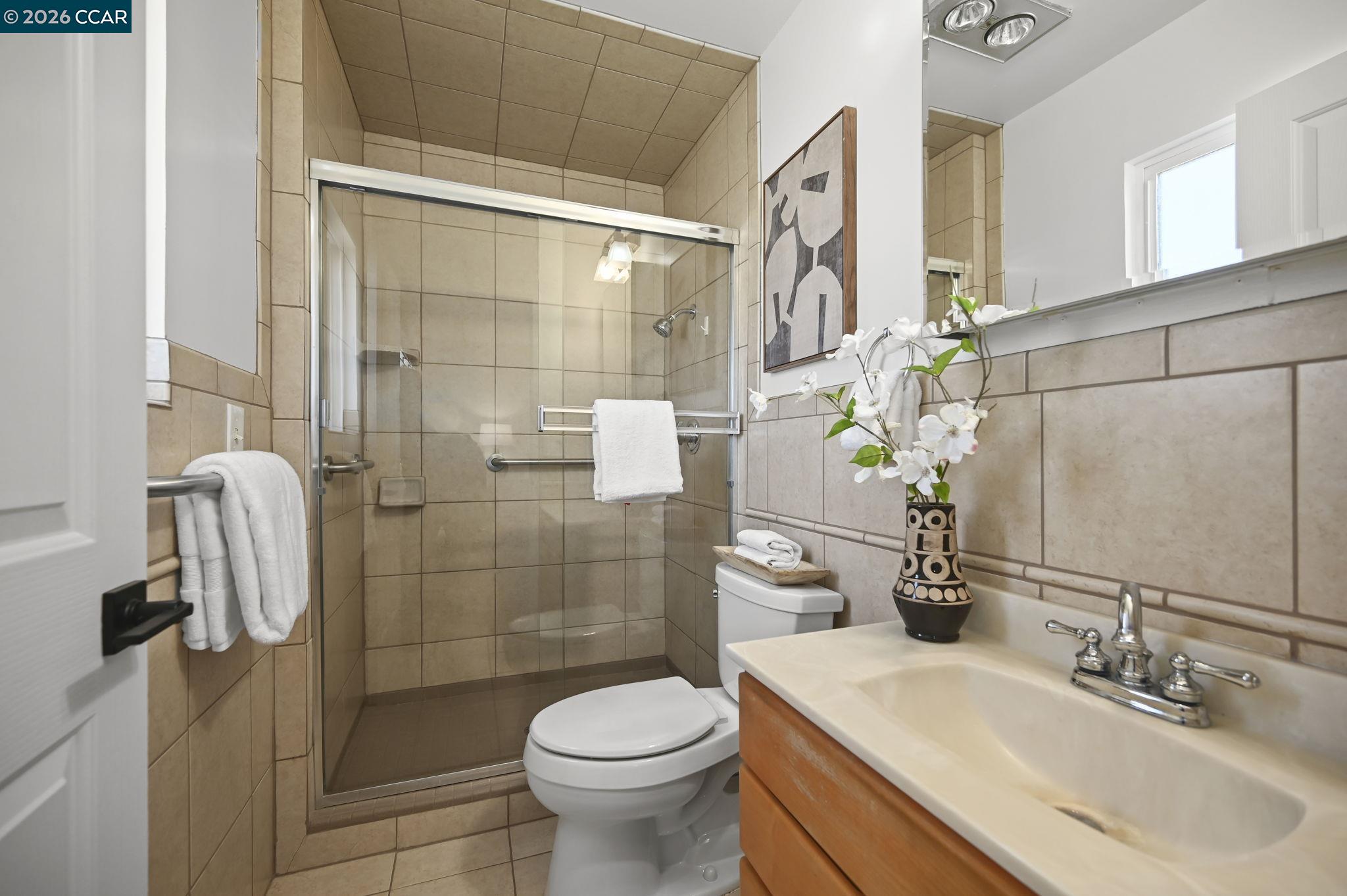 118 Neptune Place San Ramon, CA 94583 - Photo 17 of 36 a bathroom with a sink toilet and shower