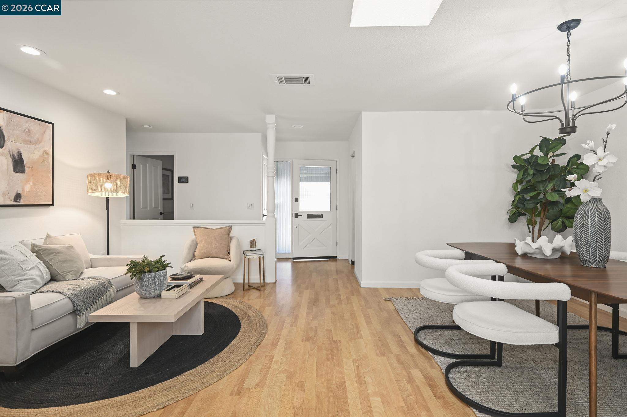 118 Neptune Place San Ramon, CA 94583 - Photo 3 of 36 a living room with furniture and a potted plant