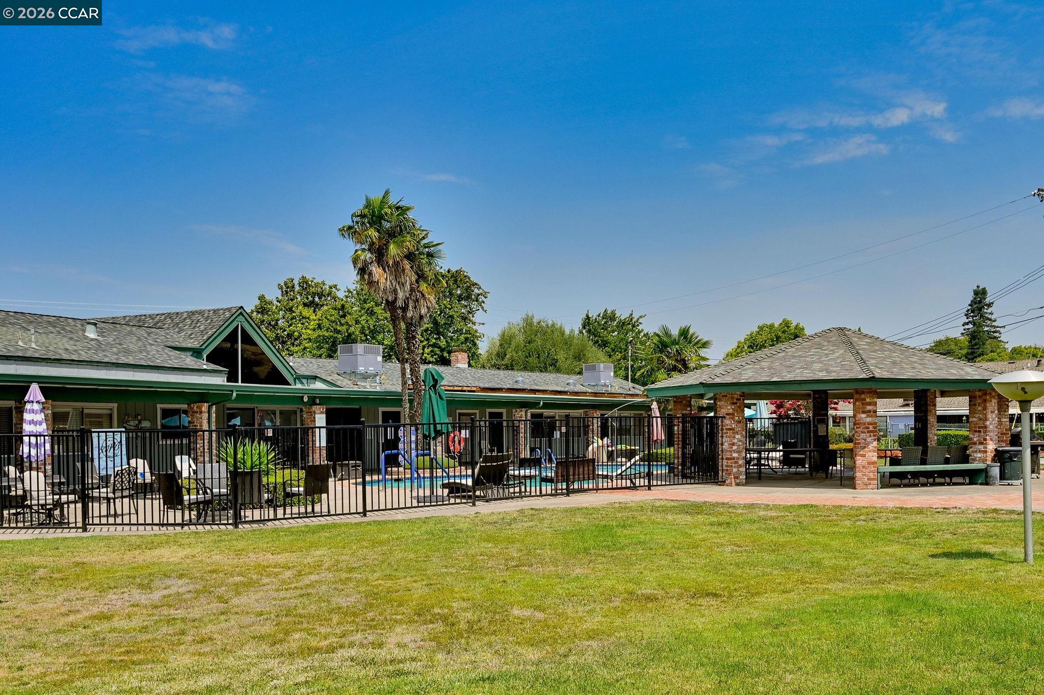 118 Neptune Place San Ramon, CA 94583 - Photo 35 of 36 a front view of a house with swimming pool having outdoor seating