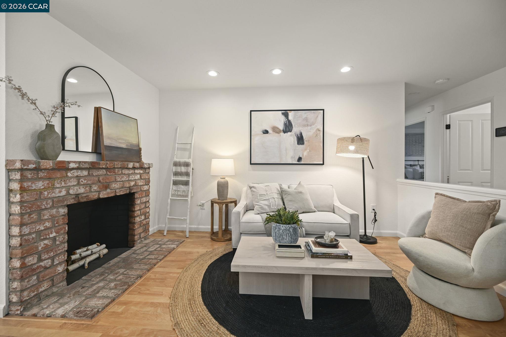 118 Neptune Place San Ramon, CA 94583 - Photo 4 of 36 a living room with furniture and a fireplace