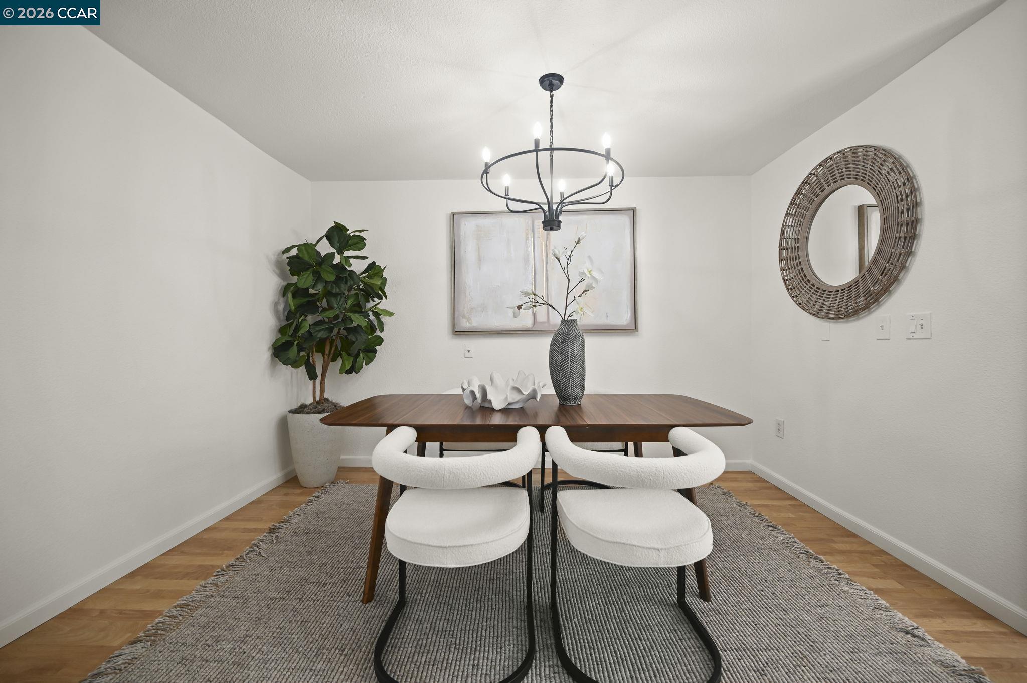 118 Neptune Place San Ramon, CA 94583 - Photo 5 of 36 a view of a dining room with furniture and chandelier