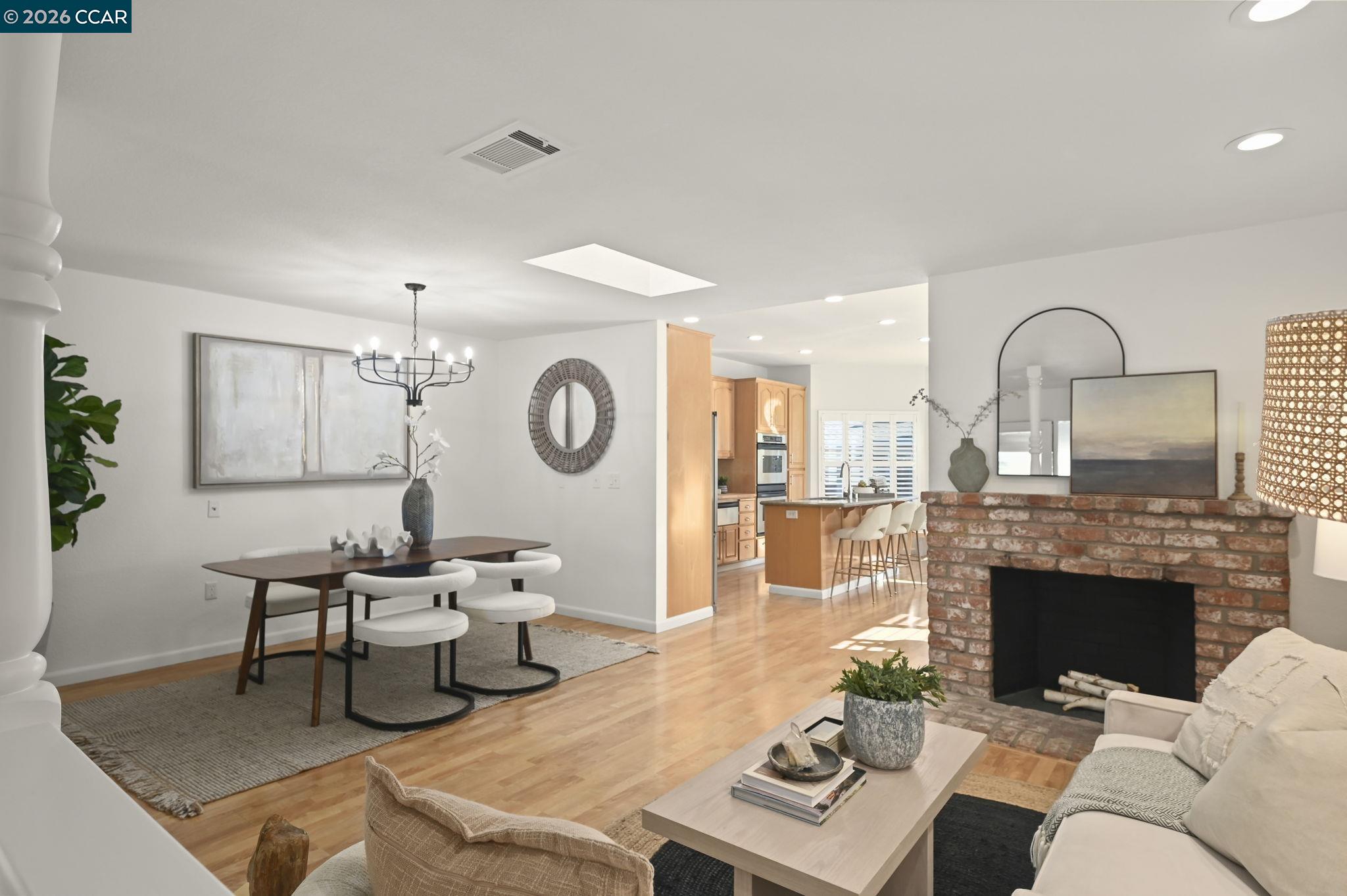 118 Neptune Place San Ramon, CA 94583 - Photo 6 of 36 a living room with furniture a fireplace and a table