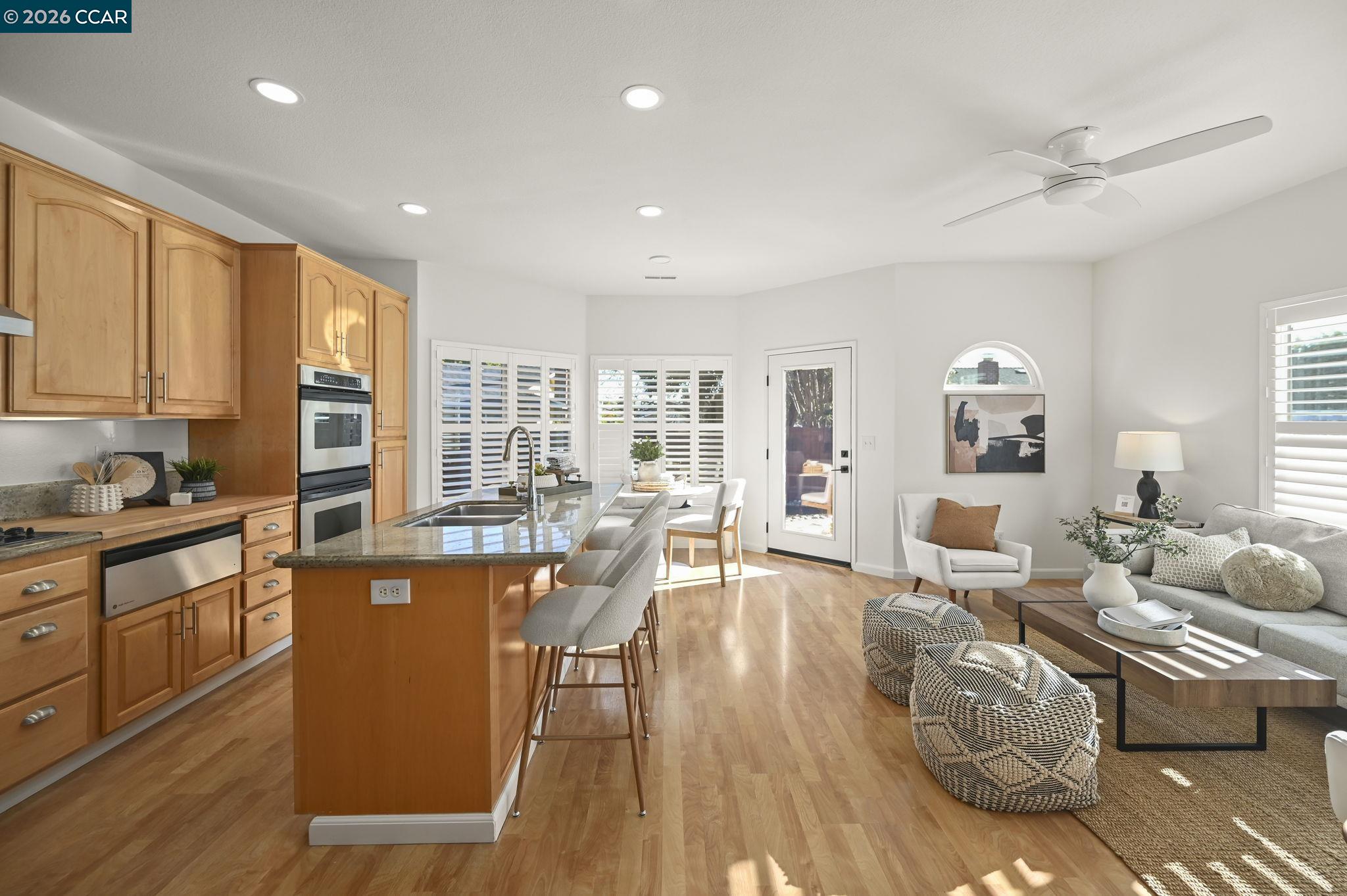 118 Neptune Place San Ramon, CA 94583 - Photo 7 of 36 a living room with furniture window and wooden floor