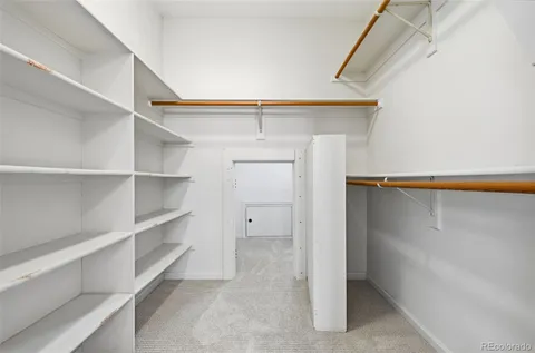 a view of an empty walk in closet