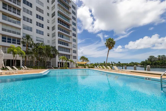 a view of a lake with a large trees