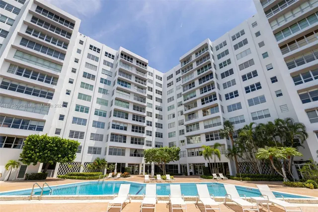 a view of a room with wooden walls