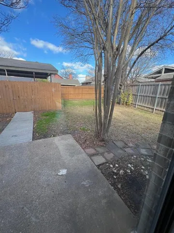 a view of outdoor space and yard