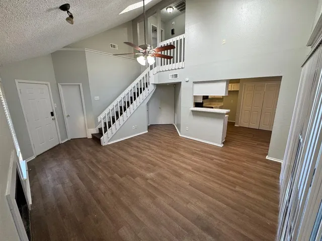 a view of entryway and kitchen