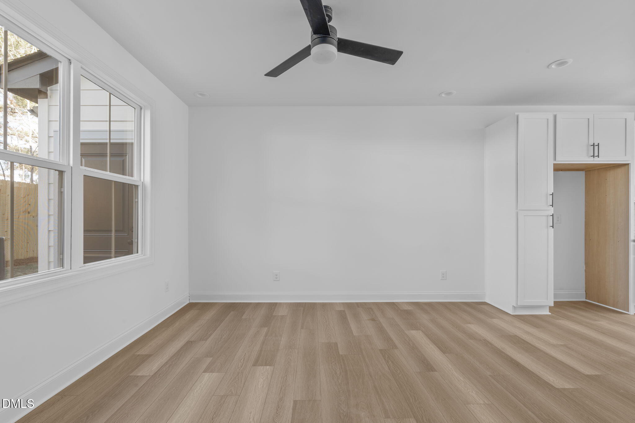 4821 Gossamer Lane, Unit 103 Raleigh, NC 27616 - Photo 9 of 46 wooden floor in an empty room