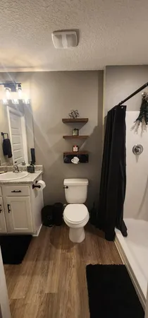 a bathroom with a sink and a toilet