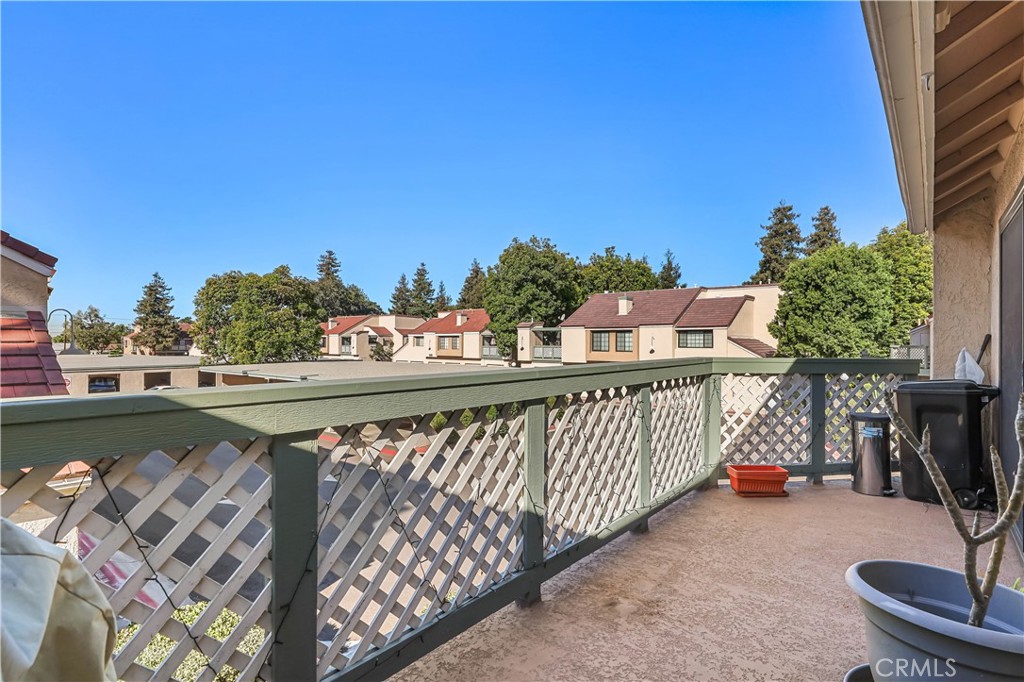 3512 West Stonepine Lane, Unit D Anaheim, CA 92804 - Photo 20 of 38 a terrace with outdoor seating and city view