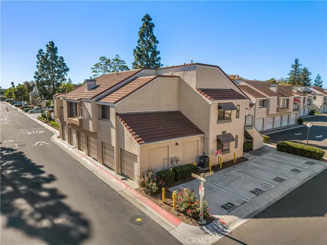 an aerial view of a house with a garden
