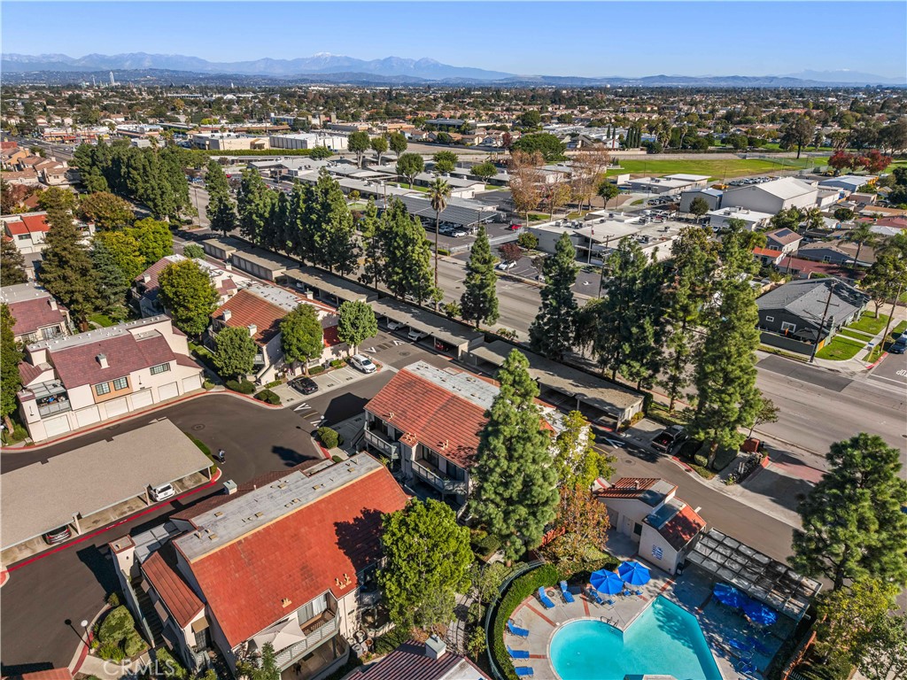 3512 West Stonepine Lane, Unit D Anaheim, CA 92804 - Photo 35 of 38 an aerial view of residential houses and outdoor space