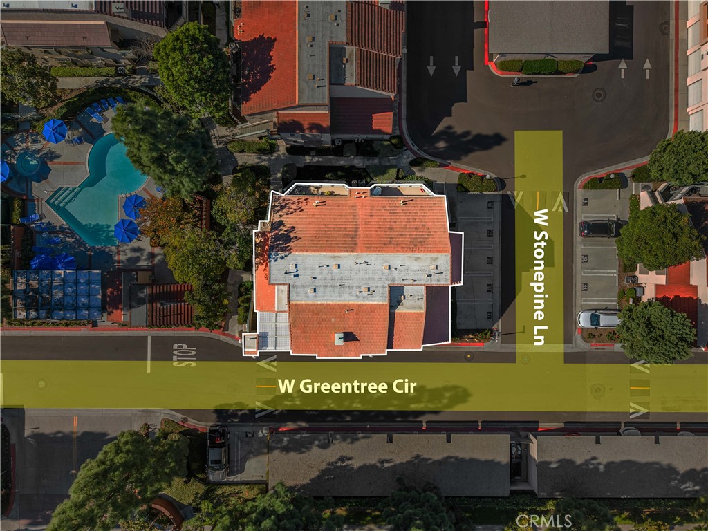 3512 West Stonepine Lane, Unit D Anaheim, CA 92804 - Photo 37 of 38 an aerial view of a house with a garden