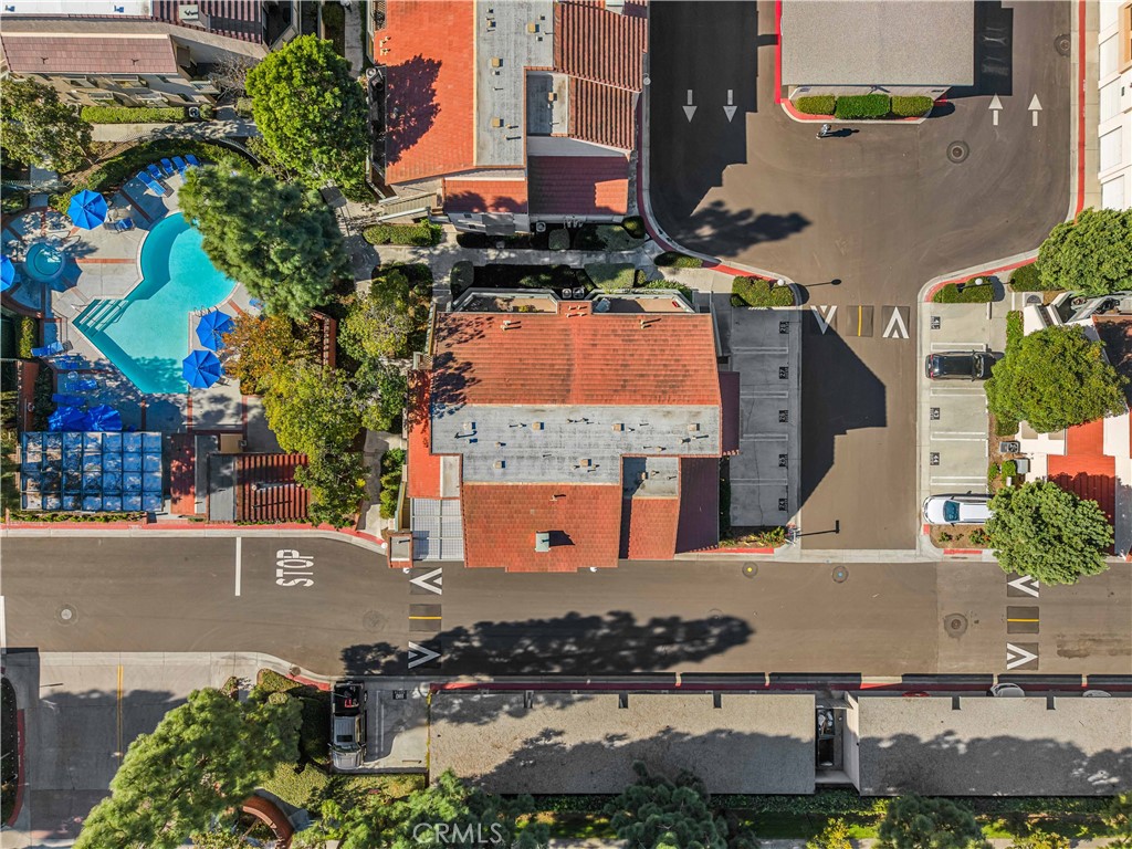 3512 West Stonepine Lane, Unit D Anaheim, CA 92804 - Photo 38 of 38 an aerial view of multiple houses with a yard