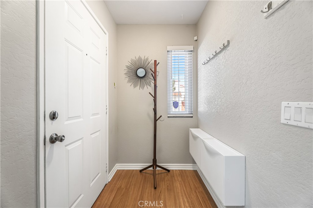 3512 West Stonepine Lane, Unit D Anaheim, CA 92804 - Photo 4 of 38 a view of a bathroom from a hallway