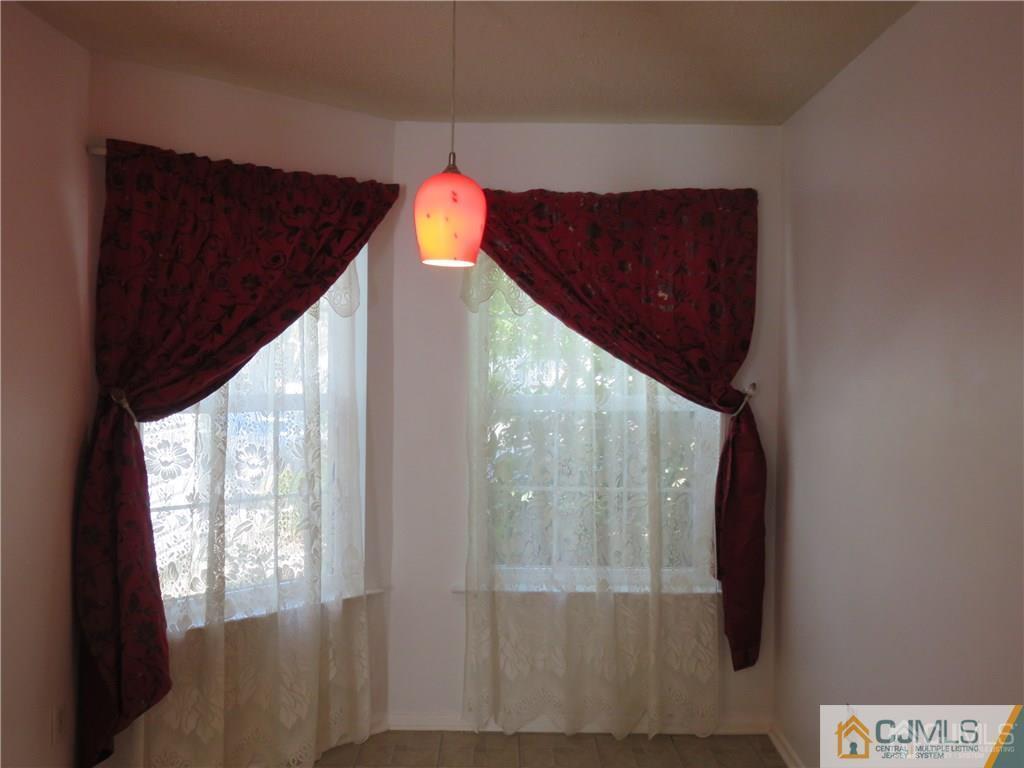 387 Draco Road, Unit 387 Piscataway, NJ 08854 - Photo 2 of 17 a view of entryway