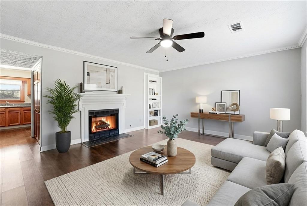 6148 Winfield Court Tucker, GA 30084 - Photo 2 of 27 a living room with furniture and a fireplace