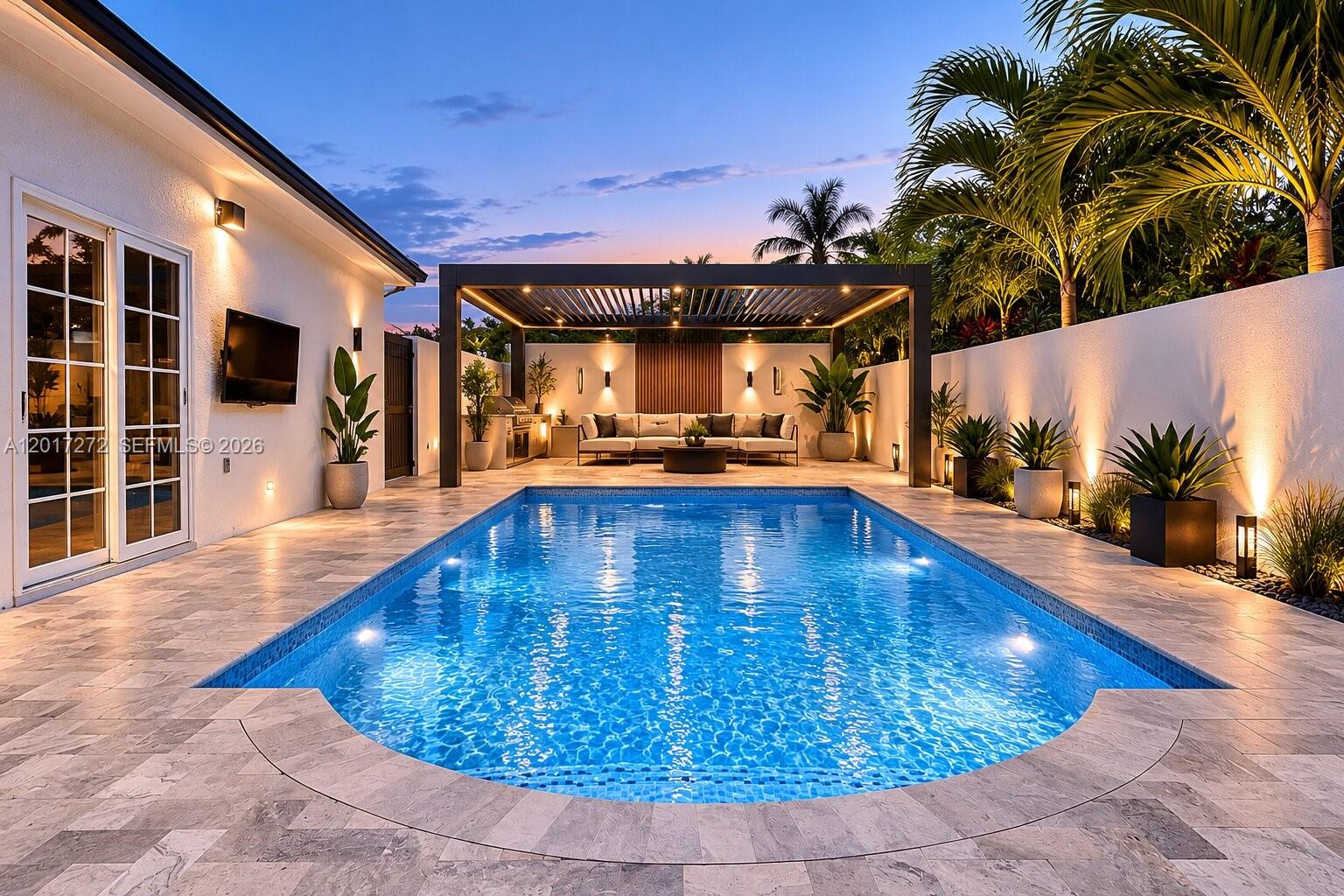 1900 Southwest 24th Street Miami, FL 33145 - Photo 3 of 24 a view of a swimming pool with an outdoor seating