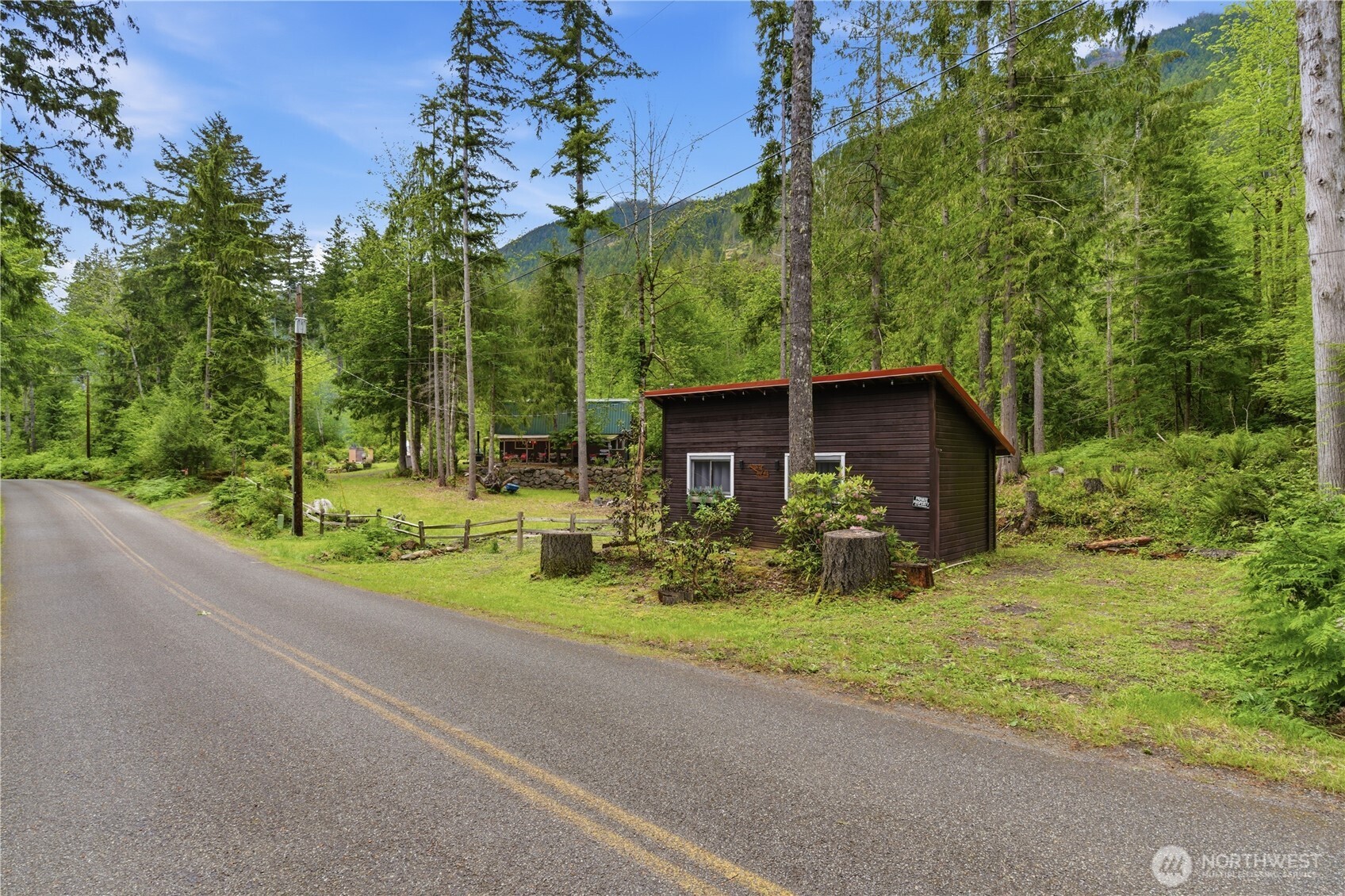 3320 Duckabush Road Brinnon, WA 98320 - Photo 27 of 38 a view of a house with backyard and garden