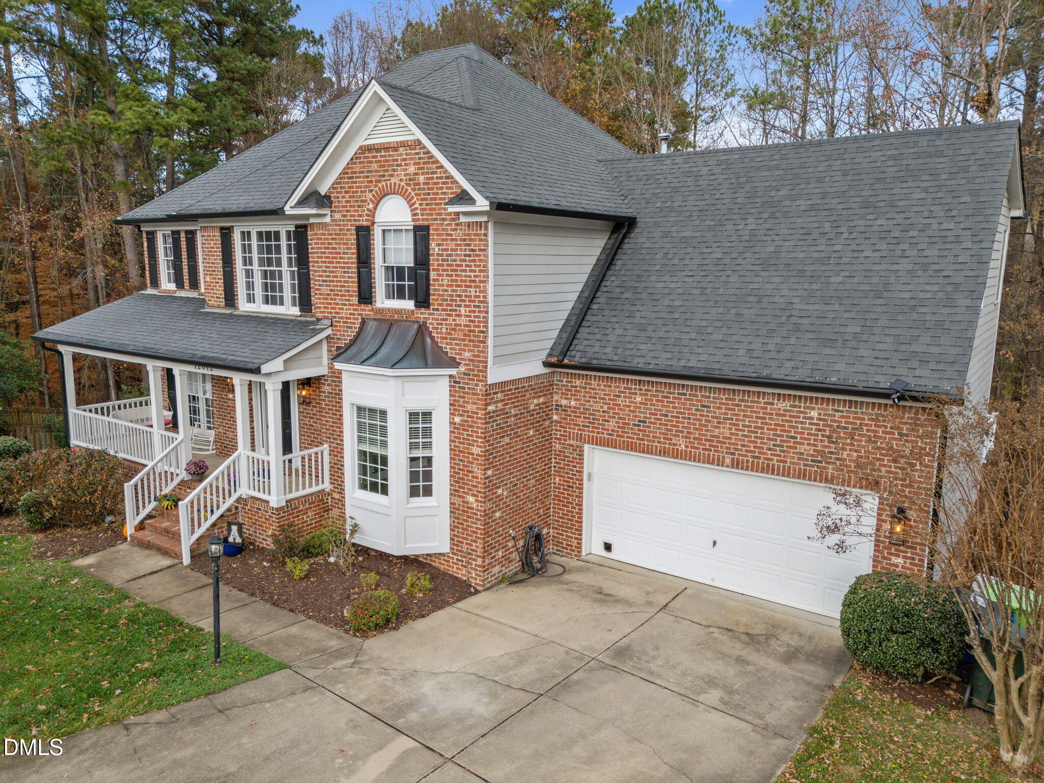 12012 Shavenrock Place Raleigh, NC 27613 - Photo 3 of 49 8-web-or-mls-DJI_20251126104711_0009_D