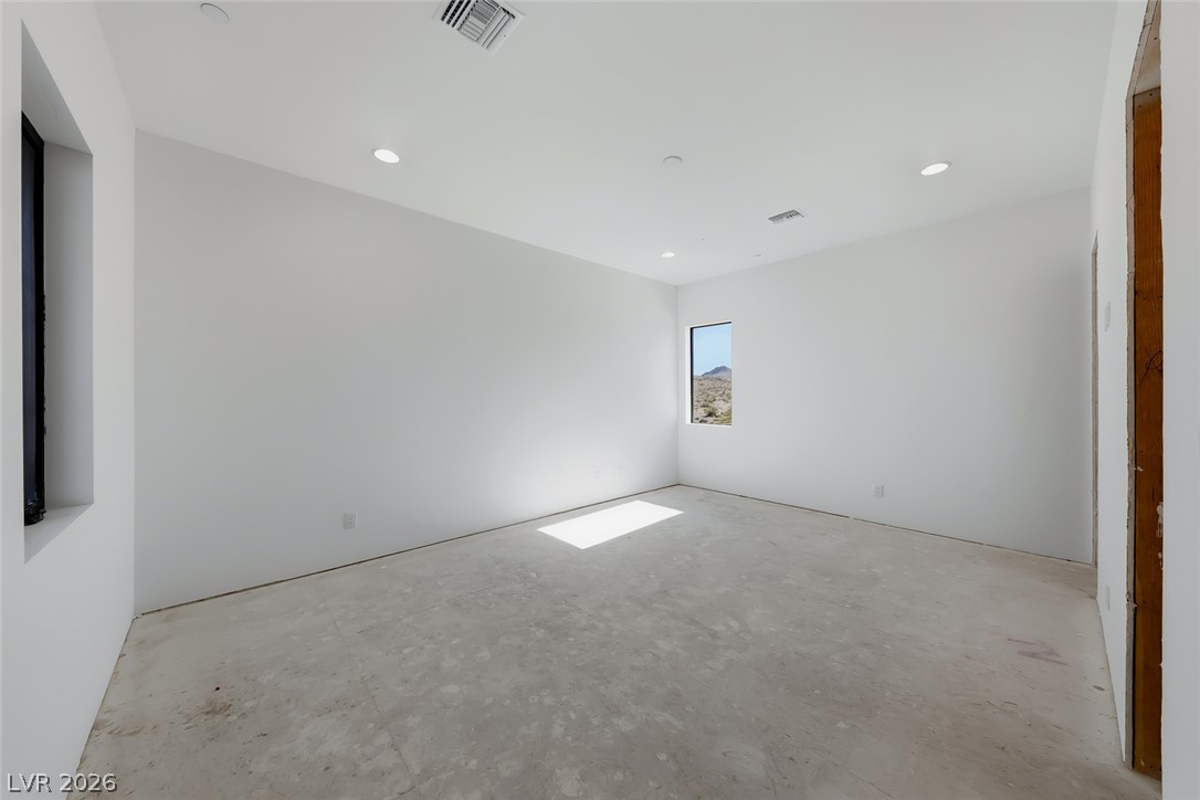 1140 Julie Road Henderson, NV 89002 - Photo 56 of 71 Sun-filled room with clean lines and views of distant hills.