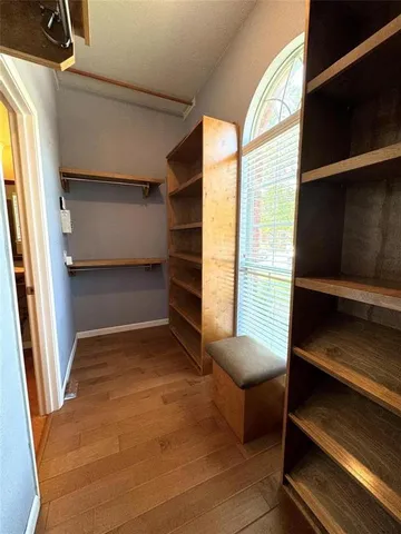 a view of room with window and stairs