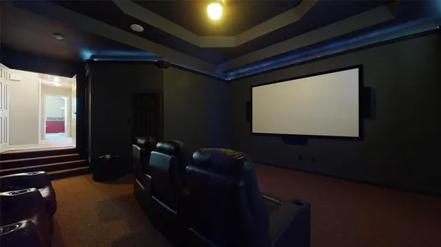 a television is sitting in a room next to a window