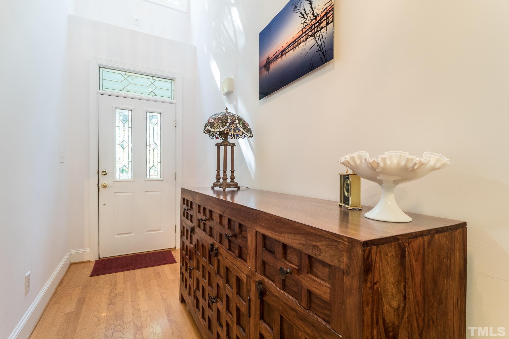 10300 Baileywick Road Raleigh, NC 27613 - Photo 4 of 26 a view of entryway with wooden floor