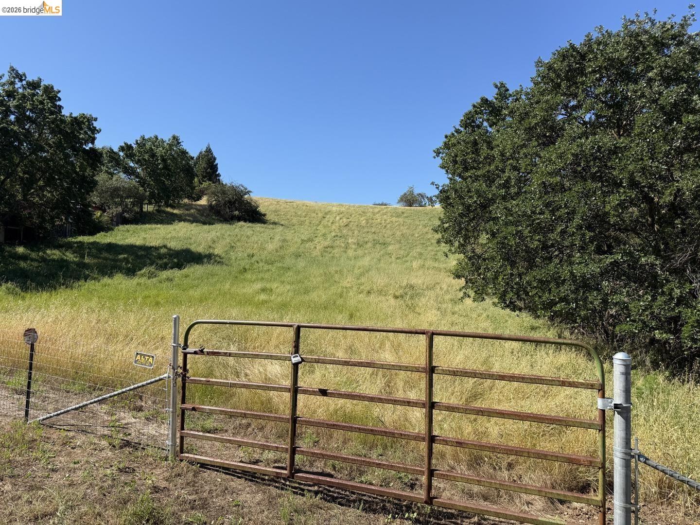 0 Cowell Road Concord, CA 94518 - Photo 3 of 13 gate featuring a rural view