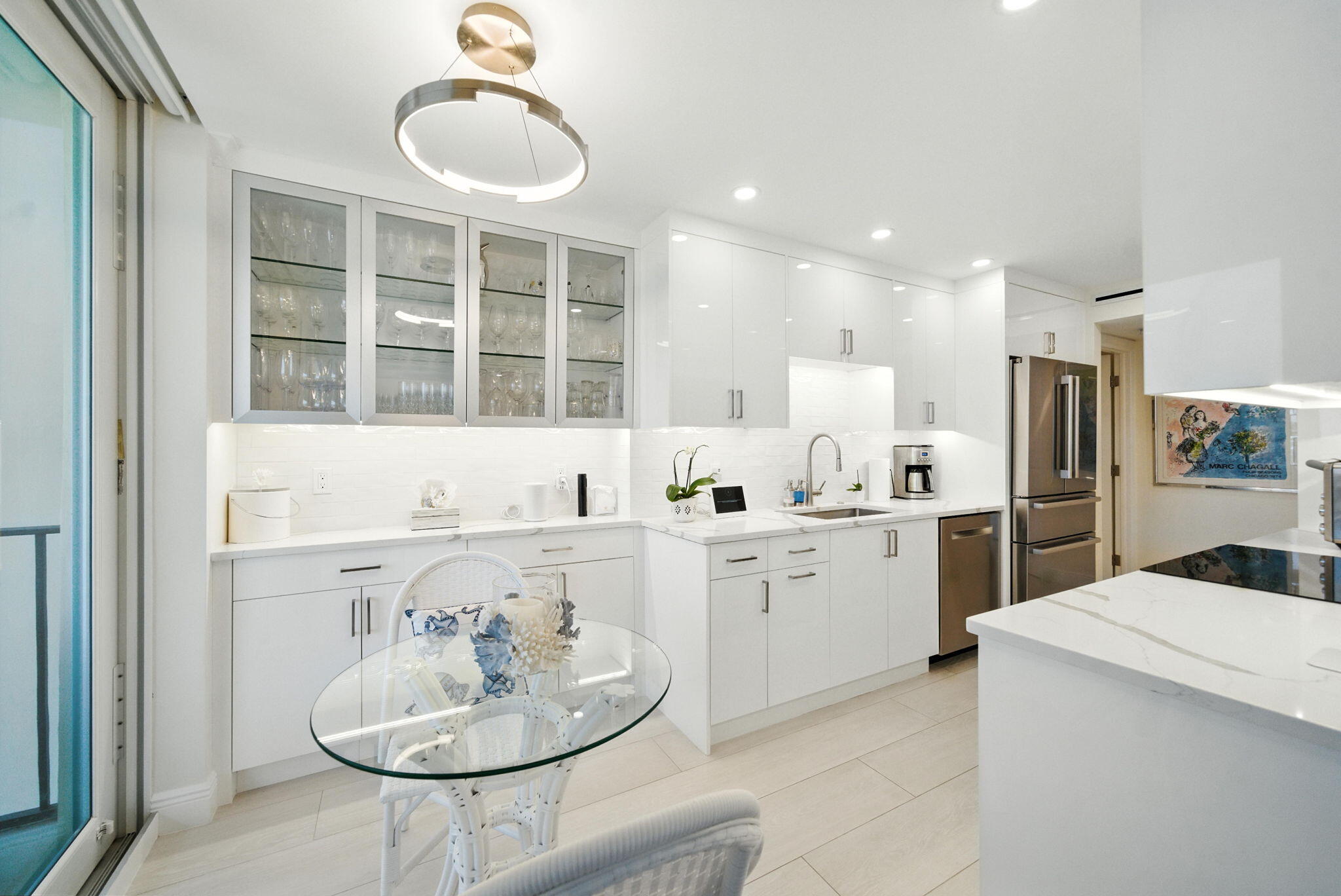 1801 South Flagler Drive, Unit 709 West Palm Beach, FL 33401 - Photo 12 of 39 a very nice looking dining room with a table and chairs in it