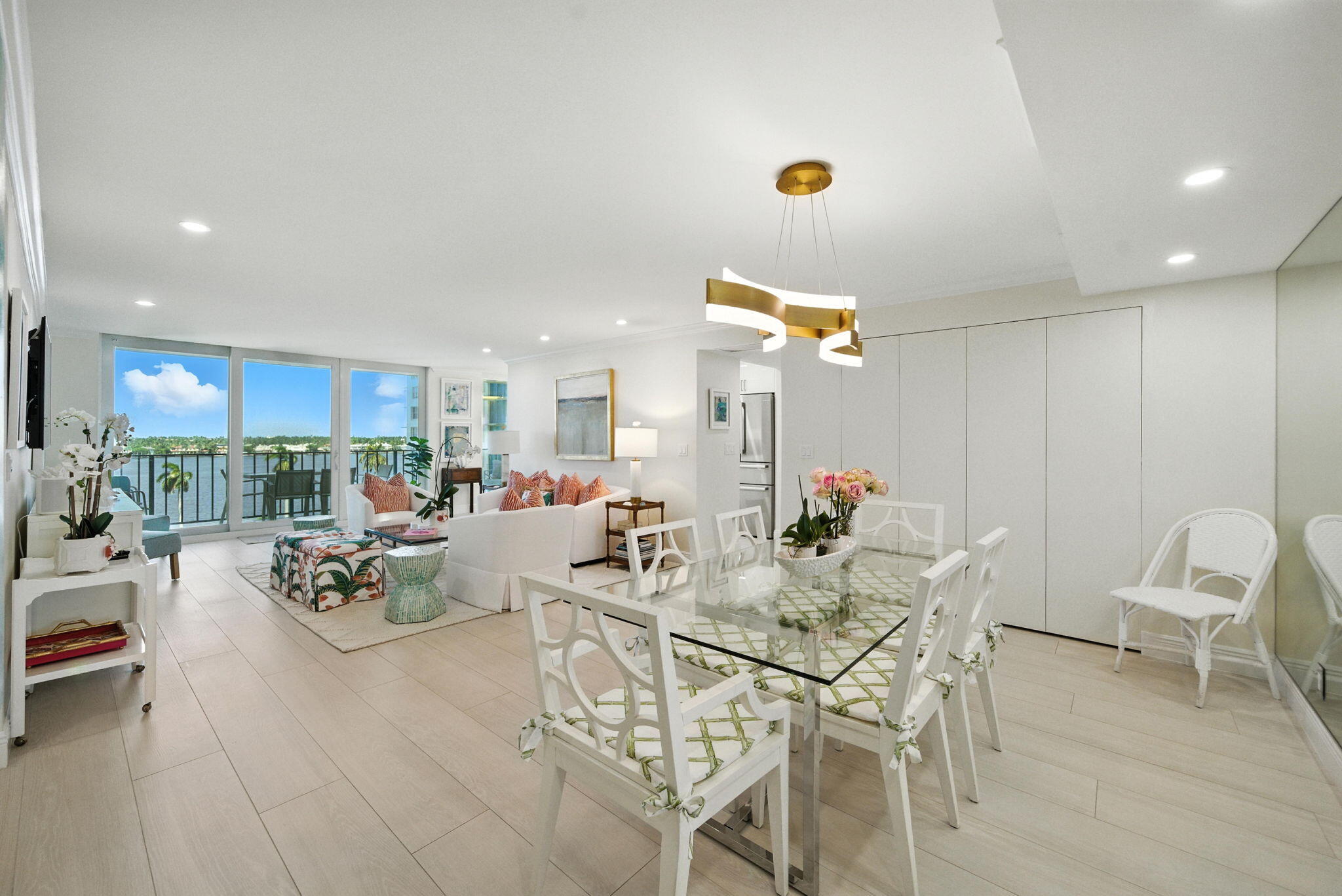 1801 South Flagler Drive, Unit 709 West Palm Beach, FL 33401 - Photo 14 of 39 a view of a dining room with furniture and a potted plant