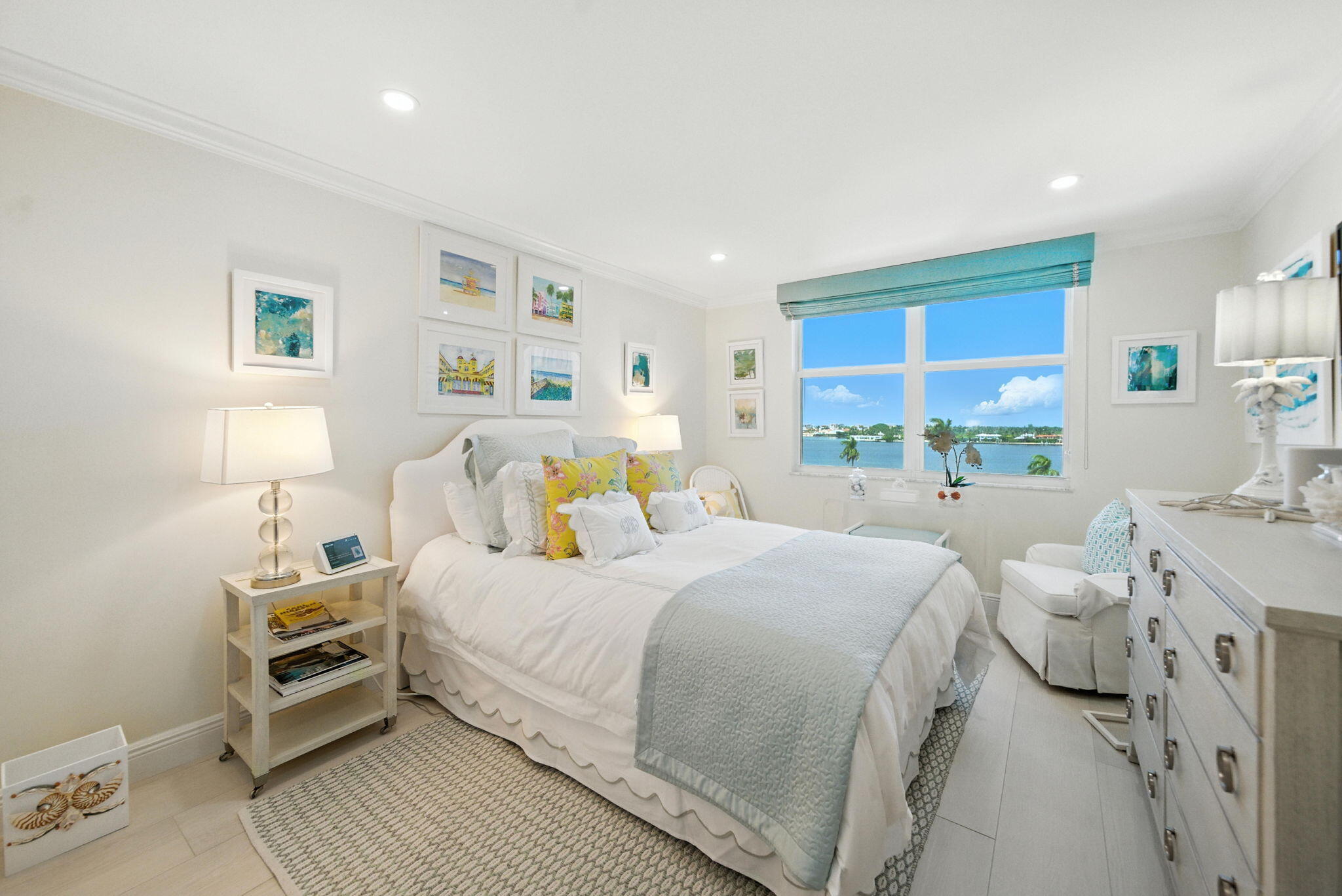 1801 South Flagler Drive, Unit 709 West Palm Beach, FL 33401 - Photo 21 of 39 a bedroom with a bed and a dresser