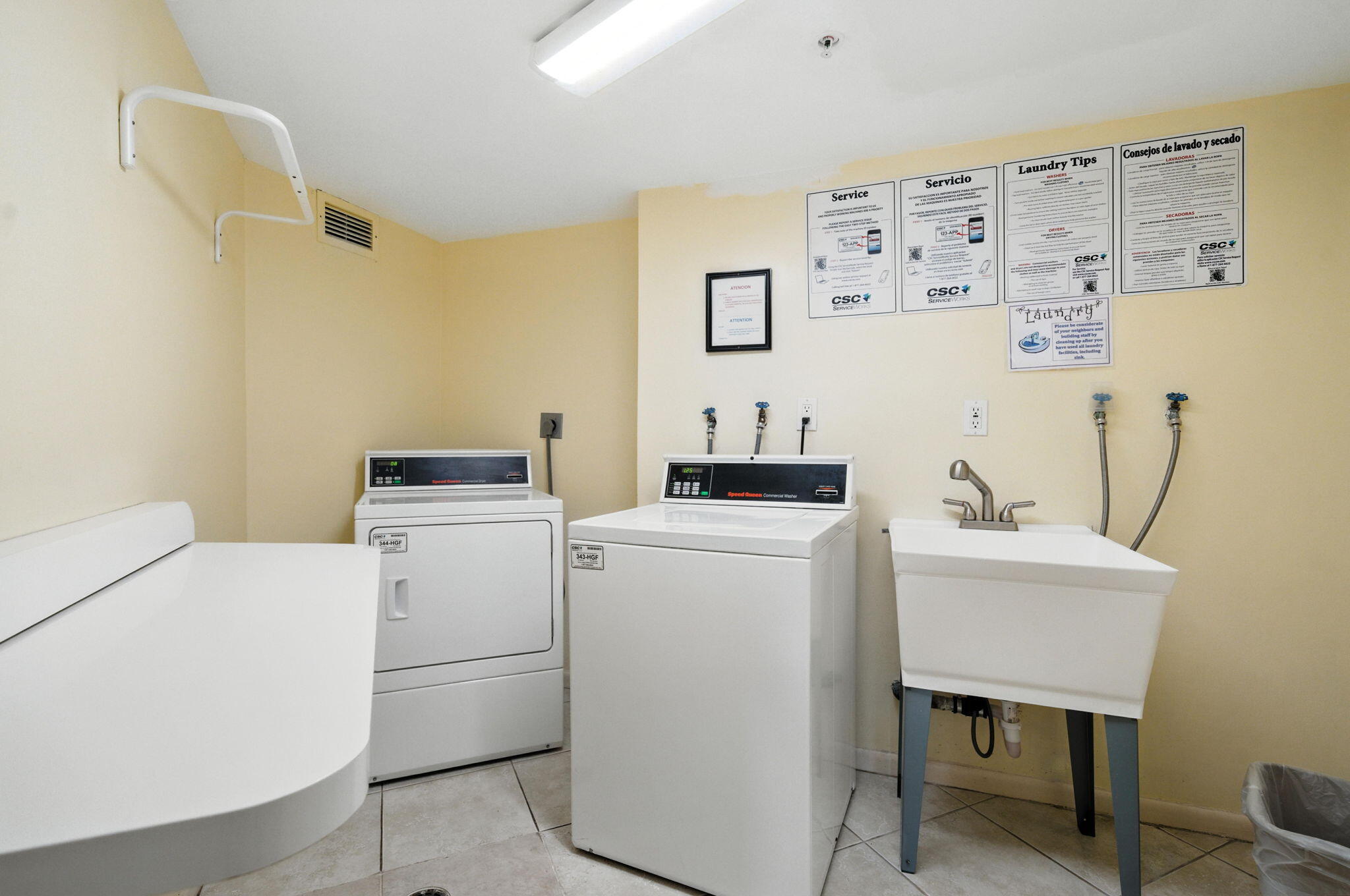 1801 South Flagler Drive, Unit 709 West Palm Beach, FL 33401 - Photo 37 of 39 a utility room with dryer and washer