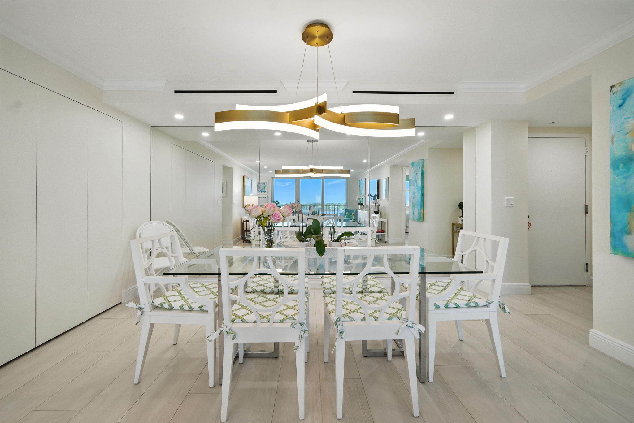 1801 South Flagler Drive, Unit 709 West Palm Beach, FL 33401 - Photo 6 of 39 a view of a dining room with furniture and wooden floor