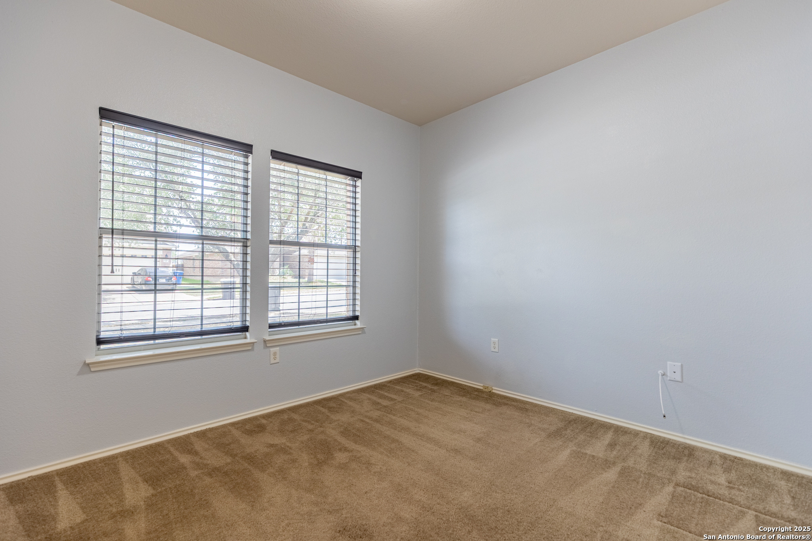 1134 Seven Iron Way San Antonio, TX 78221 - Photo 15 of 33 an empty room with a window