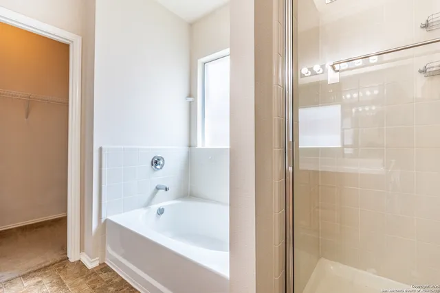 a bathroom with a sink toilet and mirror