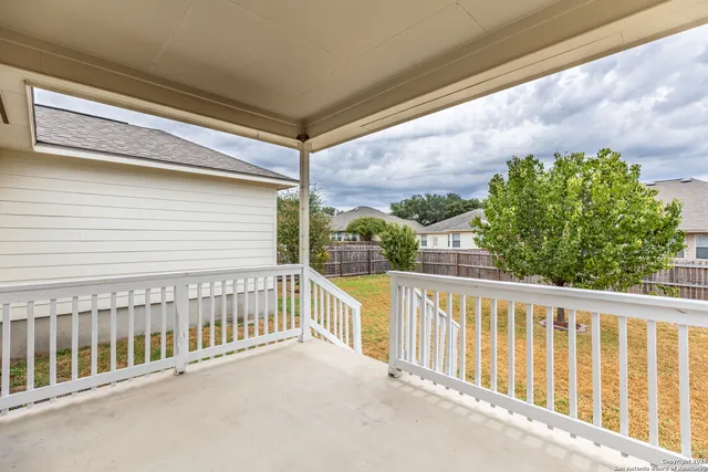 a house with trees in front of it