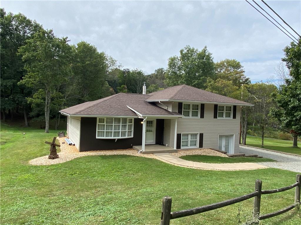 262 Thorne Run Road Export, PA 15632 - Photo 16 of 19 a front view of a house with garden