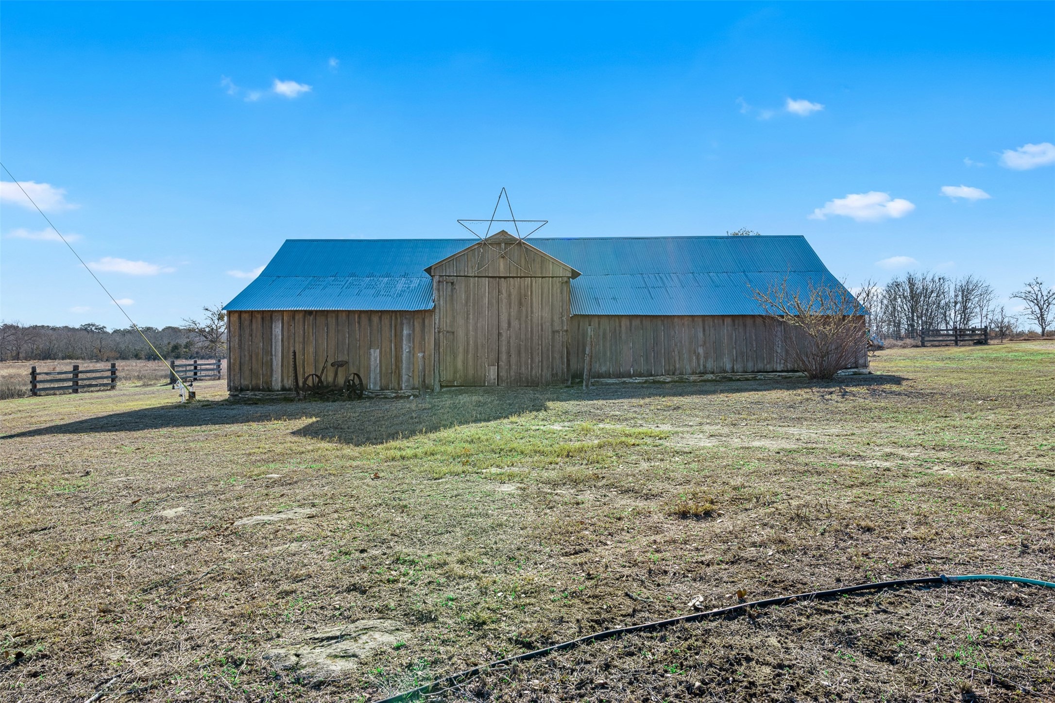 2998 Highway 237 Round Top, TX 78954 - Photo 11 of 43 a front view of a house with a yard