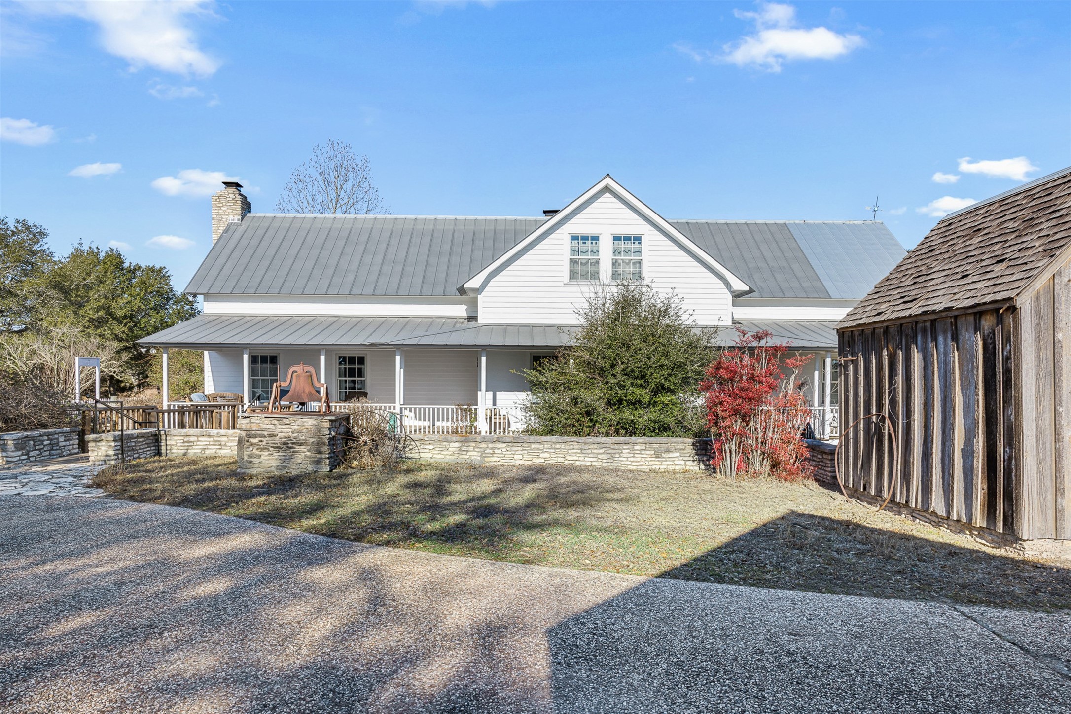 2998 Highway 237 Round Top, TX 78954 - Photo 13 of 43 a front view of a house with garden