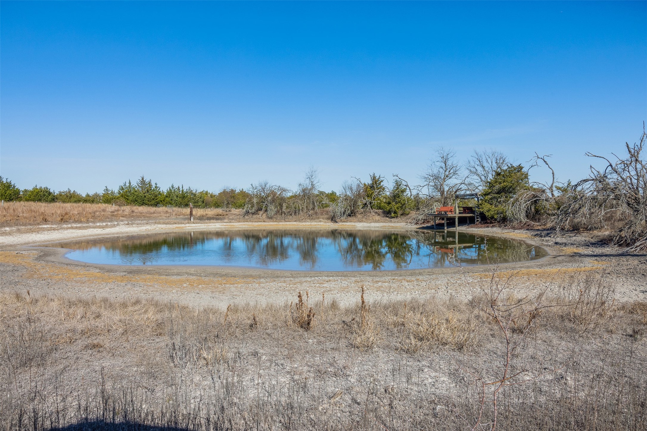2998 Highway 237 Round Top, TX 78954 - Photo 37 of 43 a view of a lake with houses in the background