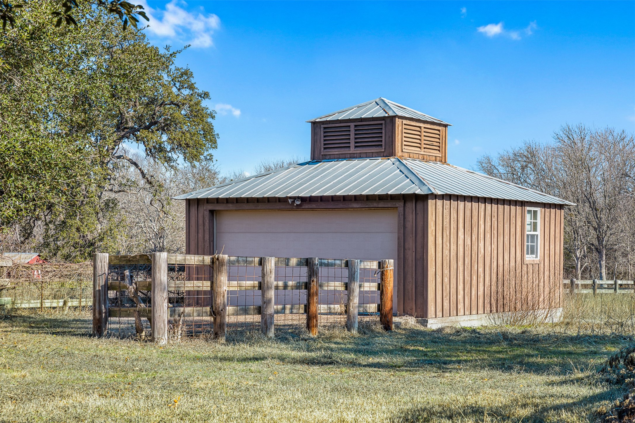 2998 Highway 237 Round Top, TX 78954 - Photo 10 of 43 a front view of a house with garden