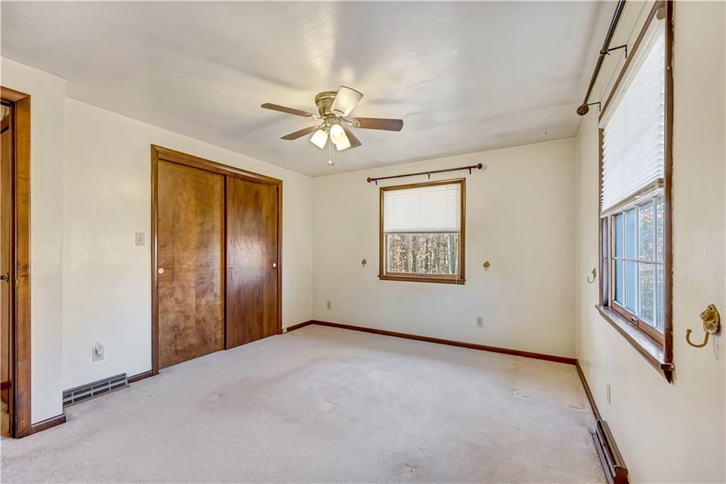18 Colwell Street Burgettstown, PA 15021 - Photo 12 of 39 a view of an empty room with a window