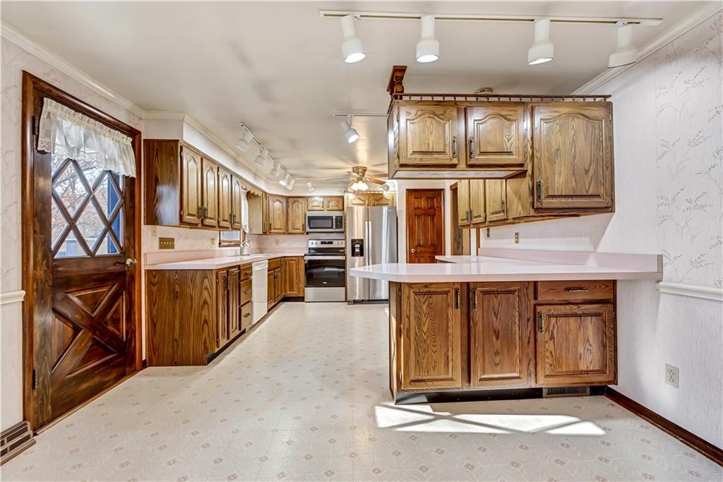 18 Colwell Street Burgettstown, PA 15021 - Photo 17 of 39 a view of kitchen with stainless steel appliances granite countertop lots of counter top space