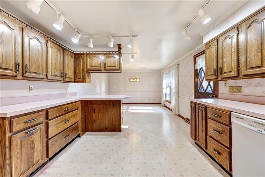 18 Colwell Street Burgettstown, PA 15021 - Photo 18 of 39 a kitchen with stainless steel appliances granite countertop a sink and cabinets