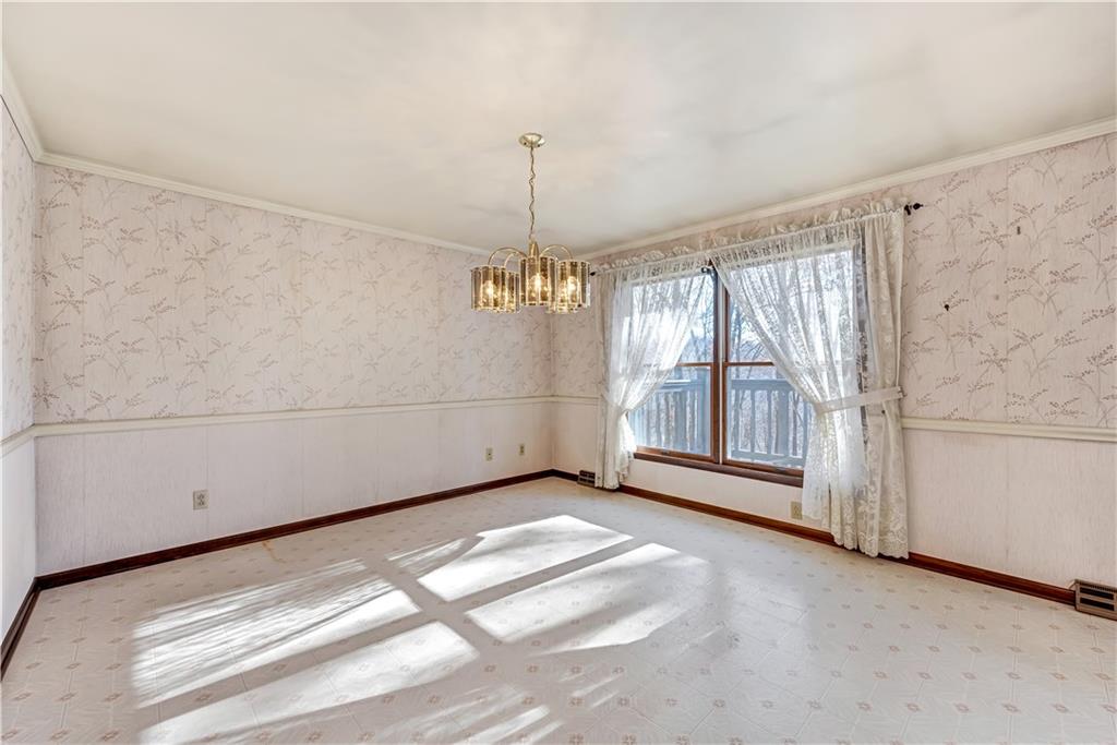 18 Colwell Street Burgettstown, PA 15021 - Photo 21 of 39 a view of a livingroom with a ceiling fan and window