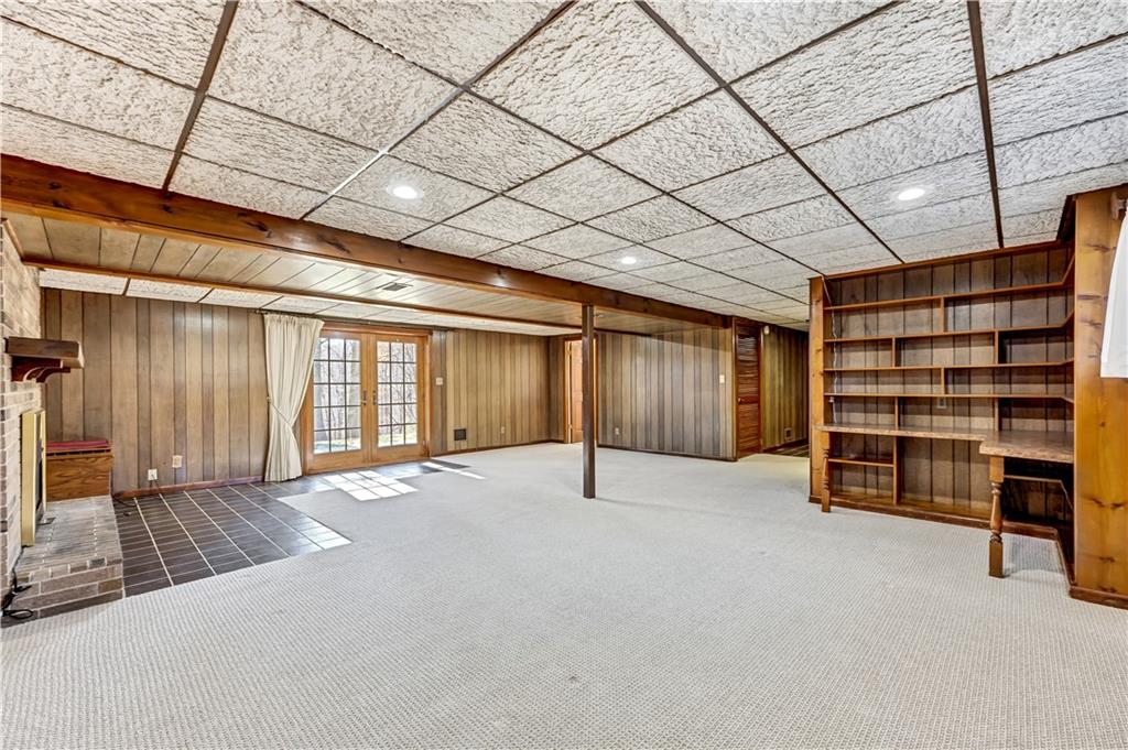 18 Colwell Street Burgettstown, PA 15021 - Photo 27 of 39 a view of an empty room with furniture and a window