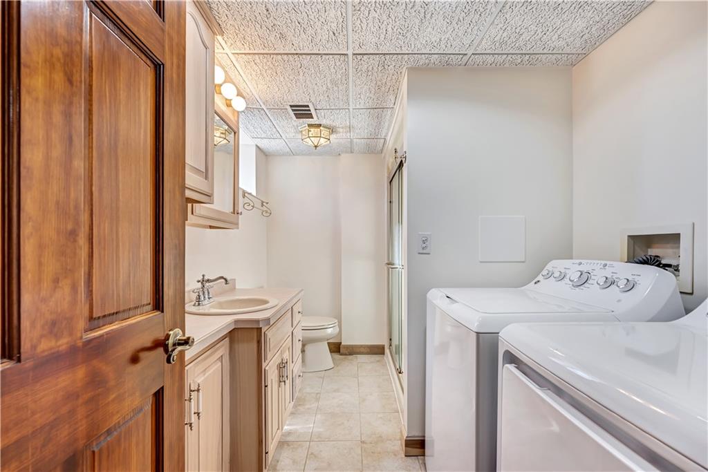 18 Colwell Street Burgettstown, PA 15021 - Photo 28 of 39 a utility room with dryer and washer