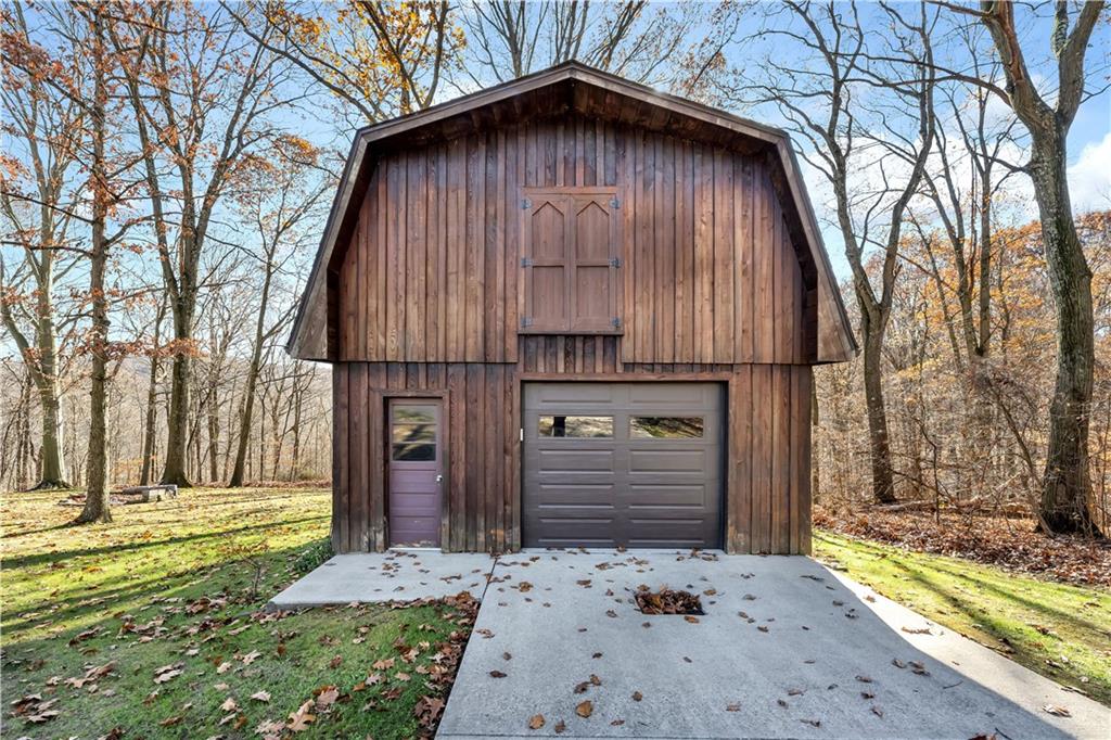 18 Colwell Street Burgettstown, PA 15021 - Photo 33 of 39 a view of a house with a small yard next to a road